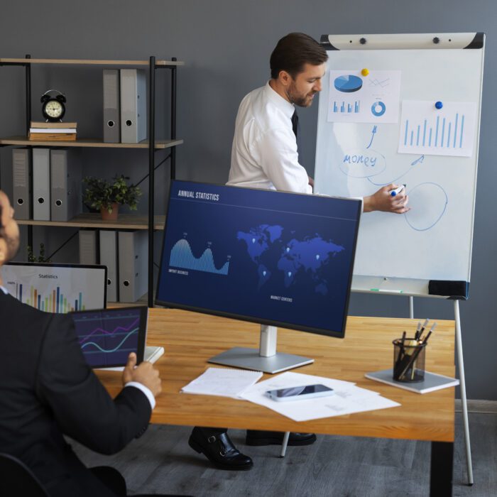 business-person-looking-finance-graphs (1) business-person-looking-finance-graphs (1)